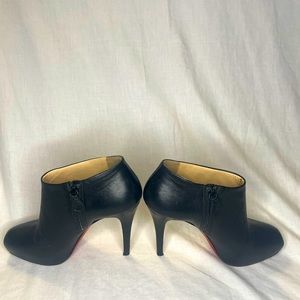 Christian Louboutin Miss Leather Platform Booties. Black leather